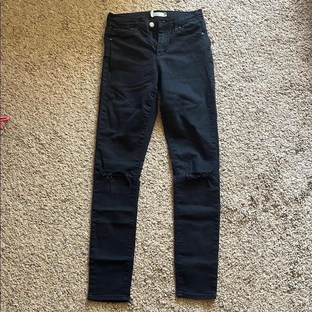 Topshop moto Leigh black jeans with distressed knee